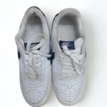 nike white & navy low top sneakers – timeless streetwear essential